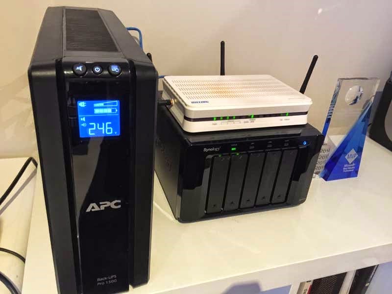 UPS on the desk with NAS and modem